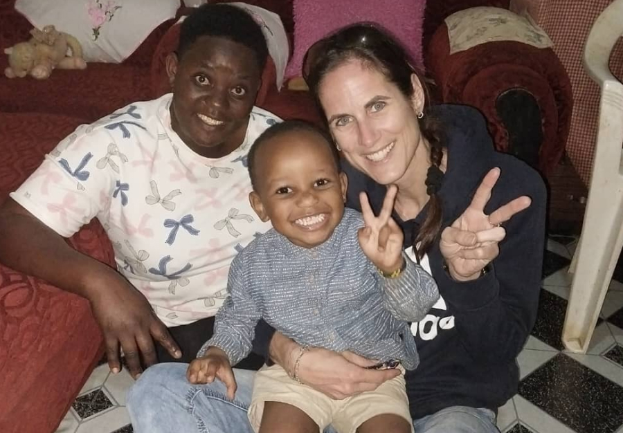 Claudia with baby during community visit