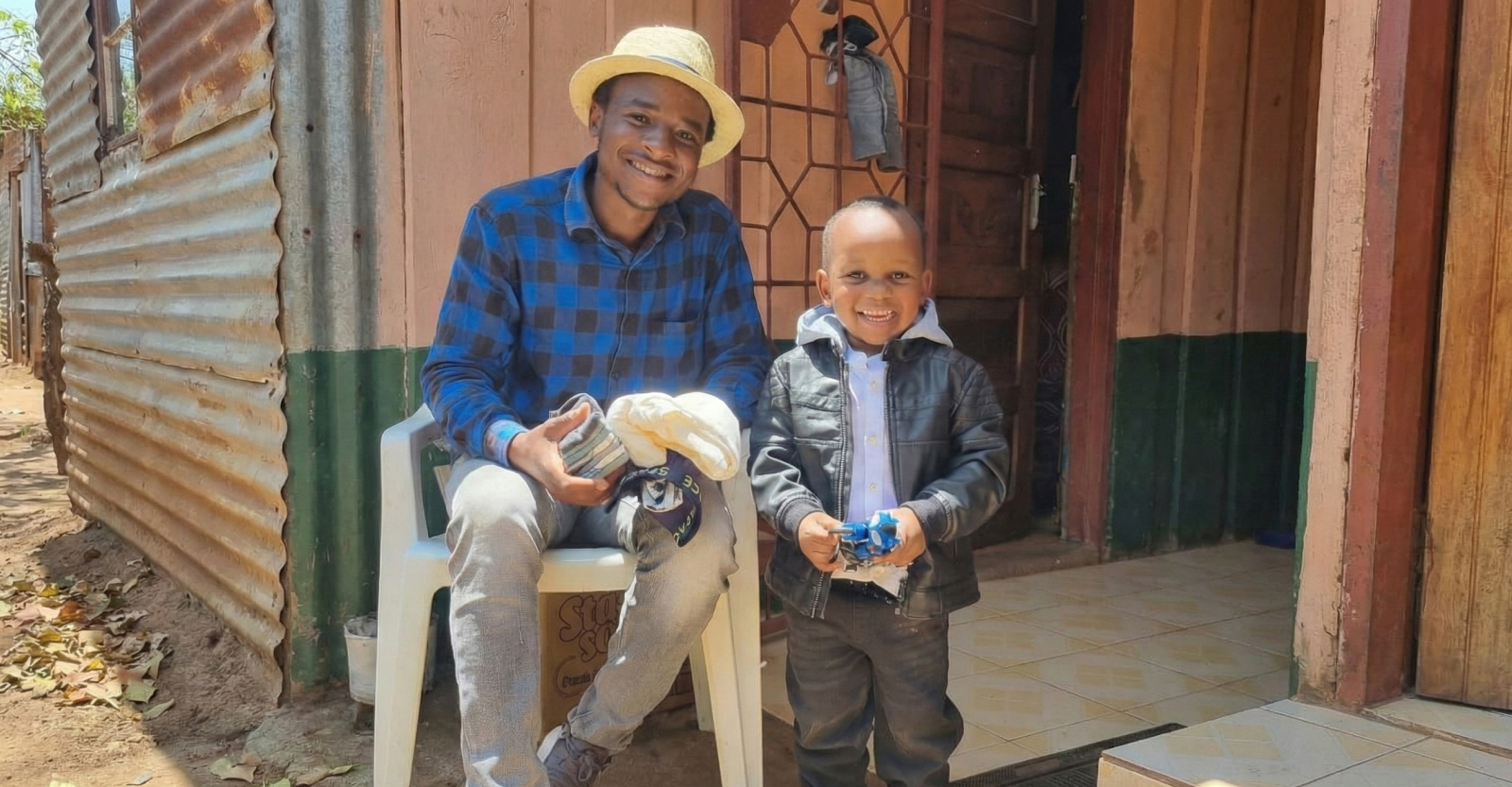 Father and son during supply distribution